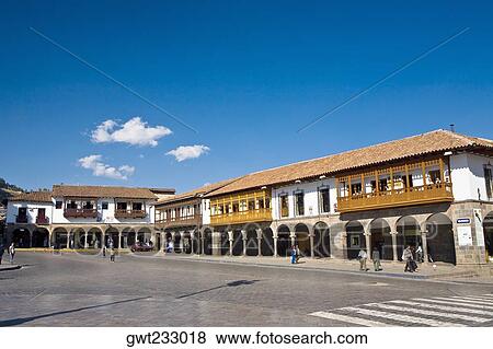 Stock Photo - Buildings along a road, Plaza-De-Armas, Cuzco, Cusco Region, Peru. Fotosearch