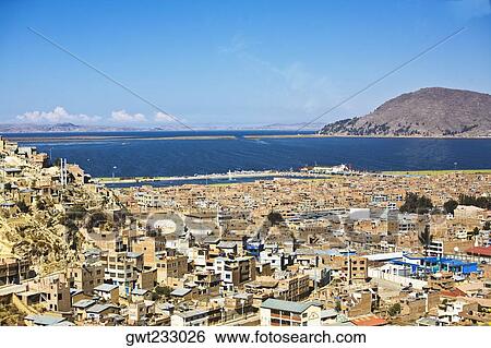 Stock Photograph - High angle view of a city, Puno, Peru. Fotosearch