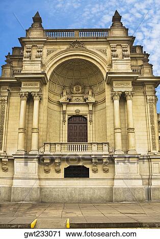 Stock Image - Low angle view of a government palace, Plaza-De-Armas, Lima, Peru. Fotosearch