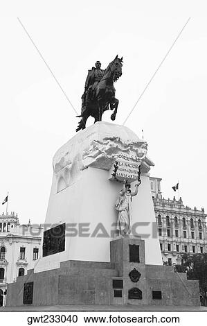 Stock Image - Low angle view of a statue in a city, Plaza San Martin, Lima, Peru. Fotosearch