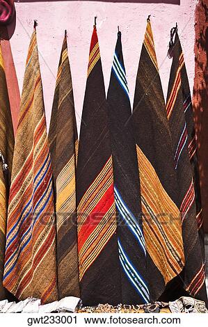 Multi-colored carpets hanging in a market stall, Pisaq, Cuzco, Peru View Large Photo Image Stock Image - Multi-colored carpets hanging in a market stall, Pisaq, Cuzco, Peru. Fotosearch