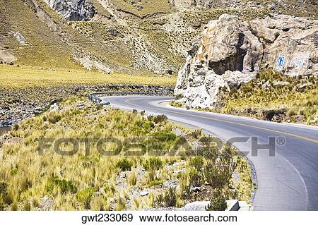 Stock Photo - Road passing through a landscape, Arequipa-Puno, Peru. Fotosearch