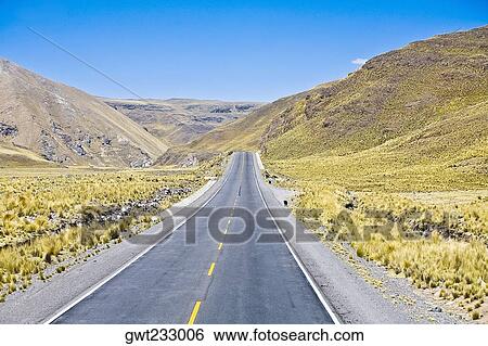 Stock Photograph - Road passing through a landscape, Arequipa-Puno, Peru. Fotosearch