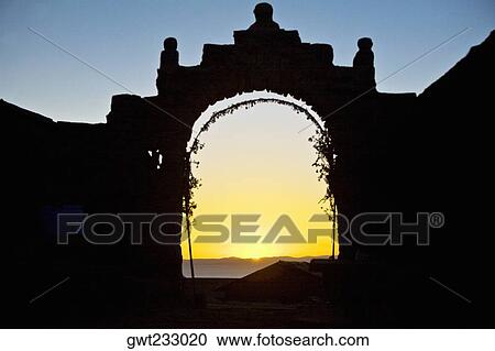 Silhouette of an entrance gate, Lake Titicaca, Taquile Island, Puno, Peru View Large Photo Image Stock Image - Silhouette of an entrance gate, Lake Titicaca, Taquile Island, Puno, Peru. Fotosearch