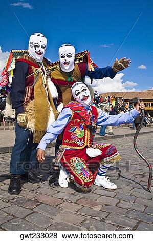 Three people wearing traditional costumes in a festival, Peru View Large Photo Image Stock Photo - Three people wearing traditional costumes in a festival, Peru. Fotosearch