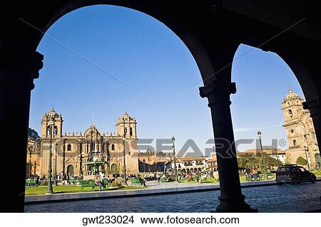 Tourists walking in front of a cathedral, Plaza-de-Armas, Cuzco, Peru View Large Photo Image Picture - Tourists walking in front of a cathedral, Plaza-de-Armas, Cuzco, Peru. Fotosearch