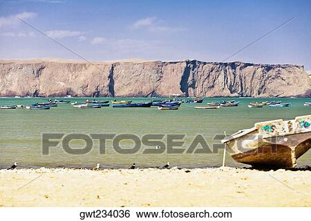 Boat on the beach, Paracas National Reserve, Paracas, Ica Region, Peru View Large Photo Image Stock Photograph - Boat on the beach, Paracas National Reserve, Paracas, Ica Region, Peru. Fotosearch