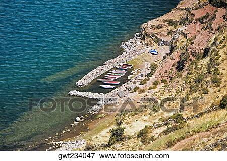 High angle view of a dock, Taquile Island, Lake Titicaca, Puno, Peru View Large Photo Image Stock Photo - High angle view of a dock, Taquile Island, Lake Titicaca, Puno, Peru. Fotosearch