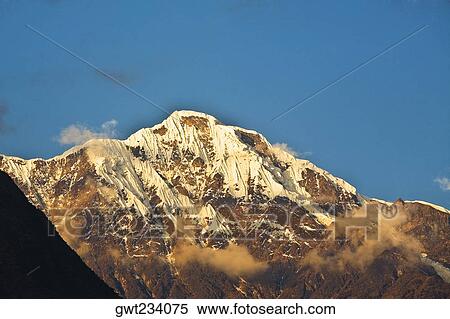 Low angle view of a snowcovered mountain, Salcantay, Choquequirao, Peru View Large Photo Image Stock Photography - Low angle view of a snowcovered mountain, Salcantay, Choquequirao, Peru. Fotosearch