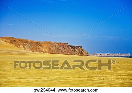 Panoramic view of an arid landscape, Paracas National Reserve, Paracas, Ica Region, Peru View Large Photo Image Picture - Panoramic view of an arid landscape, Paracas National Reserve, Paracas, Ica Region, Peru. Fotosearch