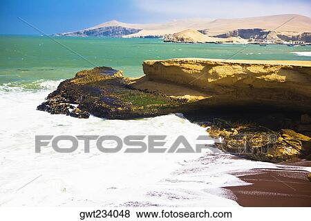 Stock Photo - Rock formations at the coast, Paracas National Reserve, Paracas, Ica Region, Peru. Fotosearch