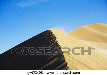 Sand dunes in a desert, Huacachina, Ica, Ica Region, Peru View Large Photo Image Stock Image - Sand dunes in a desert, Huacachina, Ica, Ica Region, Peru. Fotosearch