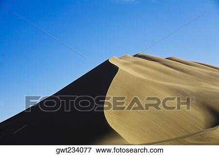 Sand dunes in a desert, Huacachina, Ica, Ica Region, Peru View Large Photo Image Stock Photo - Sand dunes in a desert, Huacachina, Ica, Ica Region, Peru. Fotosearch