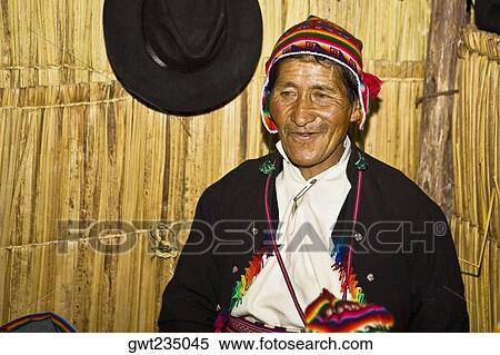 Stock Photography - Close-up of a senior man smiling, Taquile Island, Lake Titicaca, Puno, Peru. Fotosearch