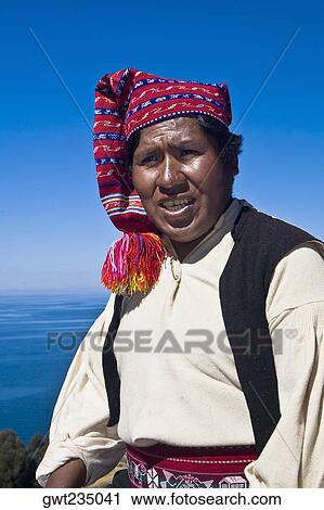 Close-up of a young man wearing headdress, Taquile Island, Lake Titicaca, Puno, Peru View Large Photo Image Stock Image - Close-up of a young man wearing headdress, Taquile Island, Lake Titicaca, Puno, Peru. Fotosearch