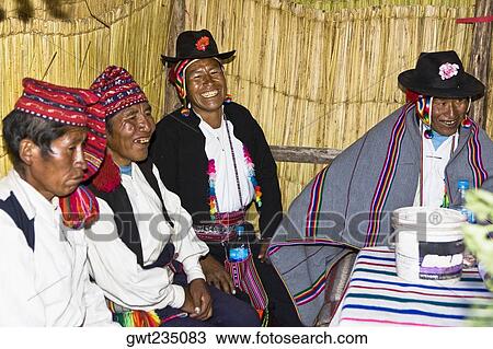 Four people sitting and smiling, Lake Titicaca, Taquile Island, Puno, Peru View Large Photo Image Stock Image - Four people sitting and smiling, Lake Titicaca, Taquile Island, Puno, Peru. Fotosearch