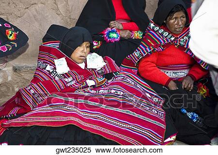 Mature woman sitting with a young woman at a wedding ceremony, Taquile Island, Lake Titicaca, Puno, Peru View Large Photo Image Stock Photography - Mature woman sitting with a young woman at a wedding ceremony, Taquile Island, Lake Titicaca, Puno, Peru. Fotosearch