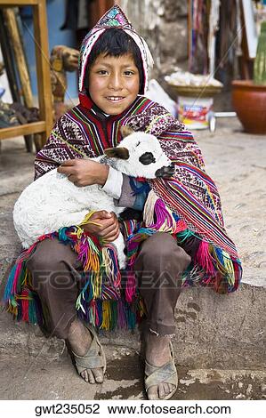 Portrait of a boy holding a lamb and smiling, Pisaq, Urubamba Valley, Peru View Large Photo Image Stock Image - Portrait of a boy holding a lamb and smiling, Pisaq, Urubamba Valley, Peru. Fotosearch