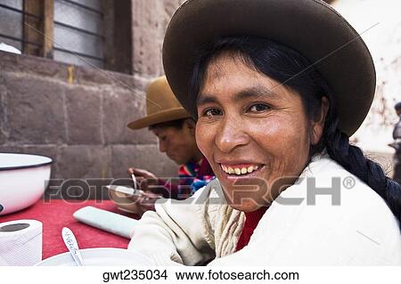 Portrait of a mid adult woman smiling, Peru View Large Photo Image Picture - Portrait of a mid adult woman smiling, Peru. Fotosearch