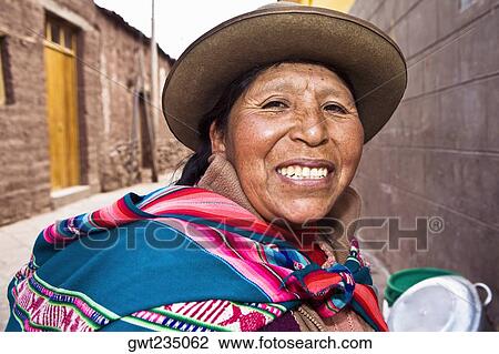 Portrait of a mid adult woman smiling, Peru View Large Photo Image Stock Image - Portrait of a mid adult woman smiling, Peru. Fotosearch