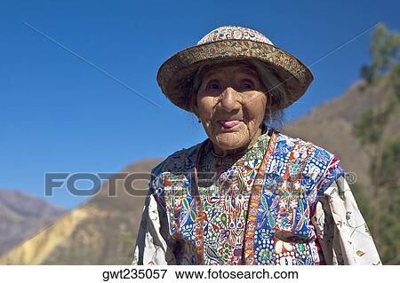 Portrait of a senior woman sticking her tongue out, Coshnirua, Peru View Large Photo Image Stock Photo - Portrait of a senior woman sticking her tongue out, Coshnirua, Peru. Fotosearch