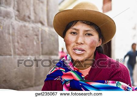 Portrait of a young woman smiling, Peru View Large Photo Image Stock Photo - Portrait of a young woman smiling, Peru. Fotosearch