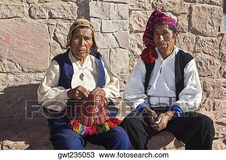 Portrait of two senior men sitting together, Taquile Island, Lake Titicaca, Puno, Peru View Large Photo Image Stock Image - Portrait of two senior men sitting together, Taquile Island, Lake Titicaca, Puno, Peru. Fotosearch