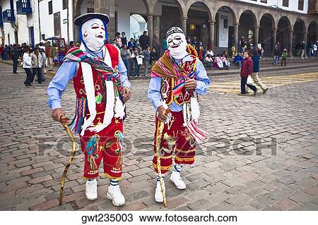 Two people wearing traditional costumes in a festival, Peru View Large Photo Image Stock Image - Two people wearing traditional costumes in a festival, Peru. Fotosearch