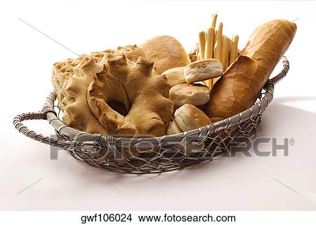Close-up of assorted breads in a wicker basket View Large Photo Image Picture - Close-up of assorted breads in a wicker basket. Fotosearch