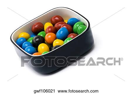 Close-up of candies in a bowl View Large Photo Image Stock Image - Close-up of candies in a bowl. Fotosearch