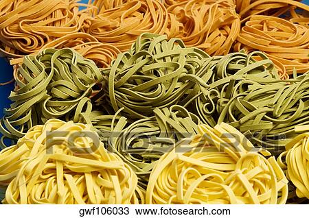 Close-up of raw tagliatelle View Large Photo Image Stock Image - Close-up of raw tagliatelle. Fotosearch