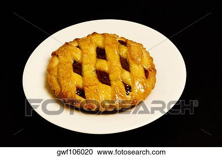 High angle view of a blueberry pie in a plate View Large Photo Image Stock Image - High angle view of a blueberry pie in a plate. Fotosearch