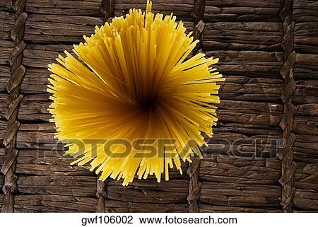 High angle view of raw spaghetti View Large Photo Image Stock Image - High angle view of raw spaghetti. Fotosearch