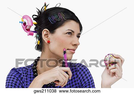 Close-up of various office supply items in a young woman's hair View Large Photo Image Stock Photo - Close-up of various office supply items in a young woman's hair. Fotosearch