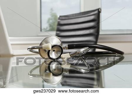 Stethoscope on a table in a clinic View Large Photo Image Stock Photo - Stethoscope on a table in a clinic. Fotosearch