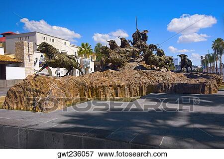 Stock Photo - Bull statues at a monument, Monumento al Encierro. Aguascalientes, Mexico. Fotosearch