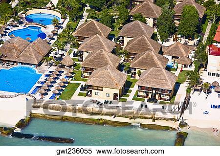High angle view of tourist resorts on the beach, Playa Del Carmen, Quintana Roo, Mexico View Large Photo Image Stock Photography - High angle view of tourist resorts on the beach, Playa Del Carmen, Quintana Roo, Mexico. Fotosearch