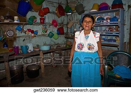 Mature woman standing in a kitchen, Papantla, Veracruz, Mexico View Large Photo Image Stock Photo - Mature woman standing in a kitchen, Papantla, Veracruz, Mexico. Fotosearch