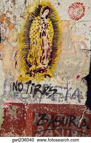 Stock Image - Paintings of Virgin Of Guadalupe on a wall, Oaxaca, Oaxaca State, Mexico. Fotosearch