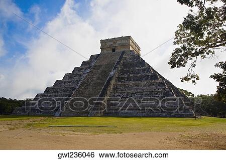 Stock Photograph - Pyramid on a landscape, Chichen Itza, Yucatan, Mexico. Fotosearch