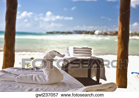 Close-up of a duck shape towel on a table, Playa Del Carmen, Quintana Roo, Mexico View Large Photo Image Stock Photo - Close-up of a duck shape towel on a table, Playa Del Carmen, Quintana Roo, Mexico. Fotosearch