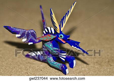 Picture - Close-up of an art representation of a dragon, Arrazola, Oaxaca State, Mexico. Fotosearch