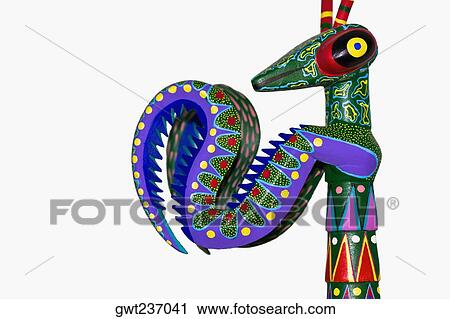Stock Image - Close-up of an art representation of a dragon, Arrazola, Oaxaca State, Mexico. Fotosearch