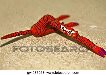 Stock Image - Close-up of an art representation of a lion, Arrazola, Oaxaca State, Mexico. Fotosearch