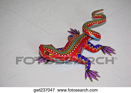 Stock Photo - Close-up of an art representation of a lizard, Arrazola, Oaxaca State, Mexico. Fotosearch