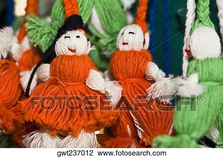 Stock Image - Close-up of hand made dolls, Santo Tomas Jalieza, Oaxaca State, Mexico. Fotosearch