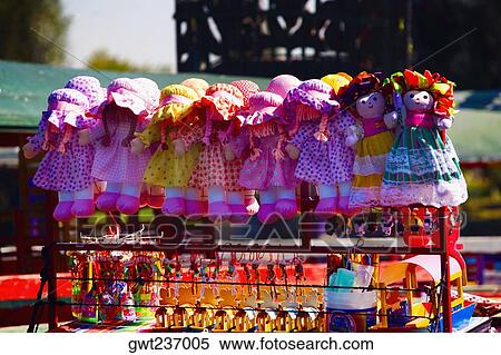Dolls hanging on a trajineras boat, Xochimilco Gardens, Mexico City, Mexico View Large Photo Image Stock Photography - Dolls hanging on a trajineras boat, Xochimilco Gardens, Mexico City, Mexico. Fotosearch
