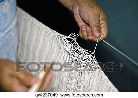 Mid section view of a man weaving, Izamal, Yucatan, Mexico View Large Photo Image Stock Photo - Mid section view of a man weaving, Izamal, Yucatan, Mexico. Fotosearch