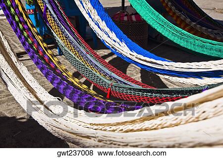 Stock Photo - Wool hanging in a row, Tlacolula De Matamoros, Oaxaca State, Mexico. Fotosearch