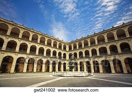 Stock Image - Fountain in the courtyard of a government building, National Palace, Zocalo, Mexico City, Mexico. Fotosearch